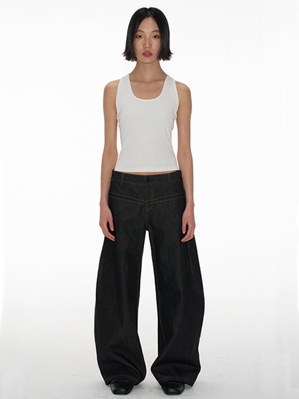 Low-Rise Curved Raw Denim Jeans
