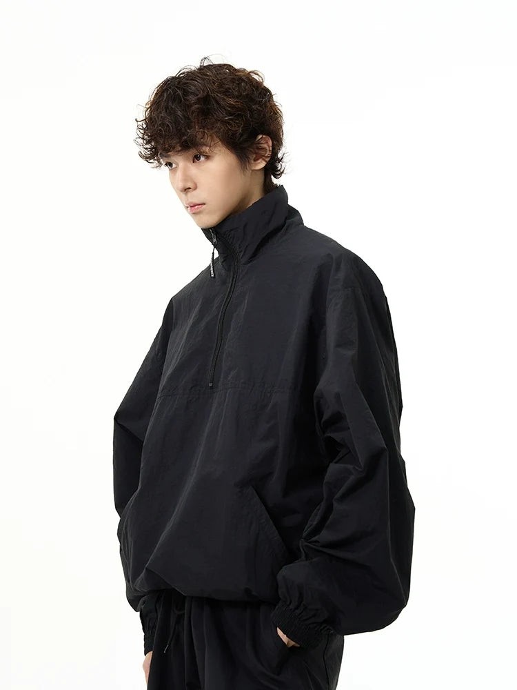 All-Black Oversized Windbreaker and Cargo Pants Setup