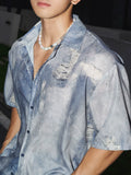 Distressed Denim Button Down Shirt