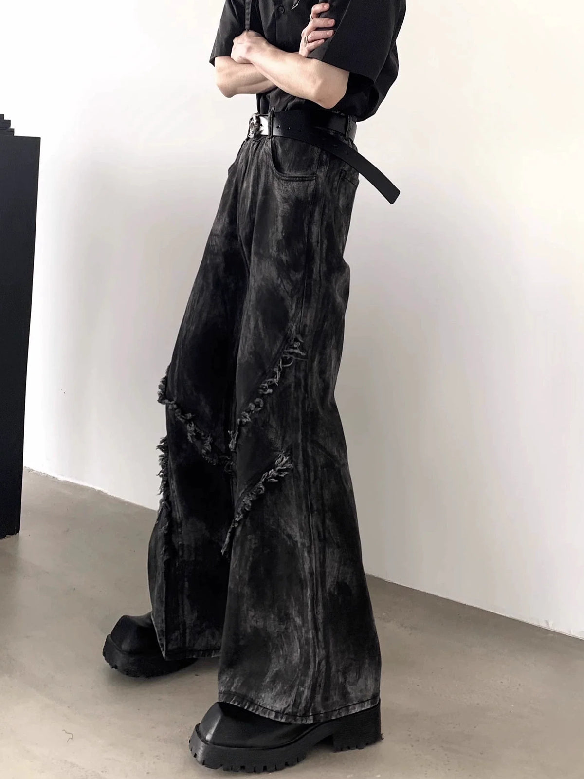 Black Distressed Flared Jeans with Frayed Seams