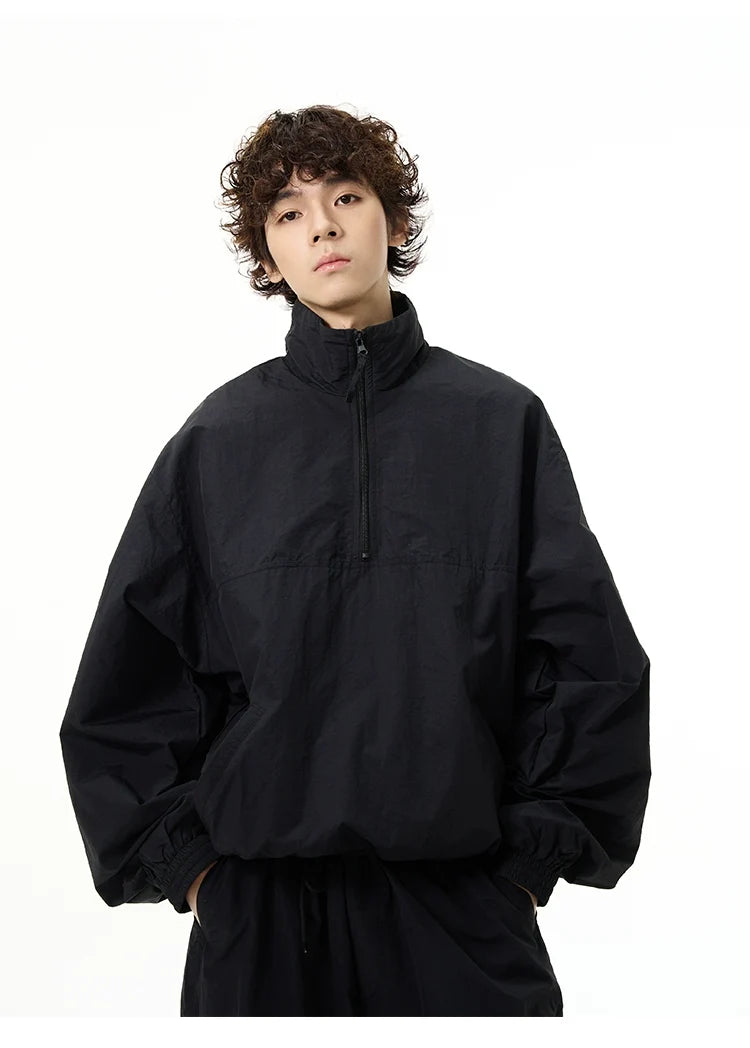 All-Black Oversized Windbreaker and Cargo Pants Setup