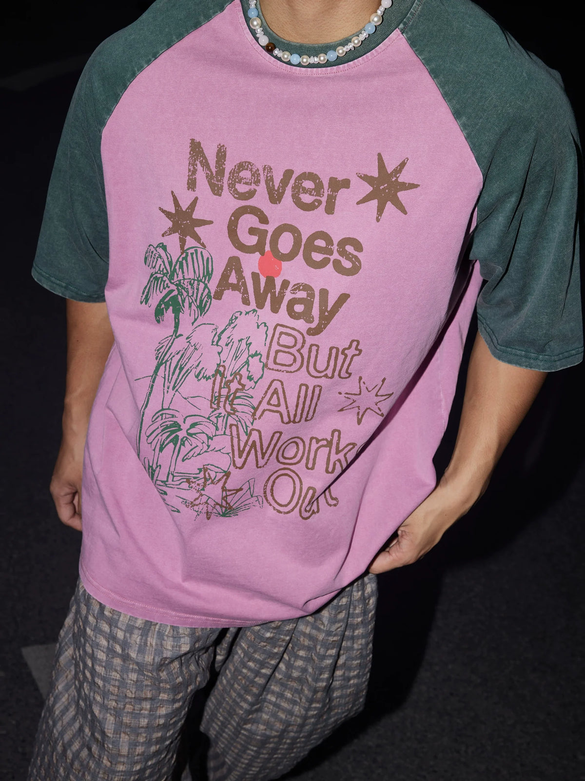 Never Goes Away Graphic Tee